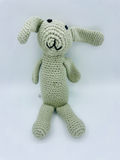 Handmade organic cotton bunny rattle in soft neutral tones, Fairtrade and ethically crafted for babies