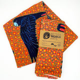 Cotton tea towel featuring licensed Aboriginal artwork, ethically printed in India using water-based inks—gentle on fabric and planet.