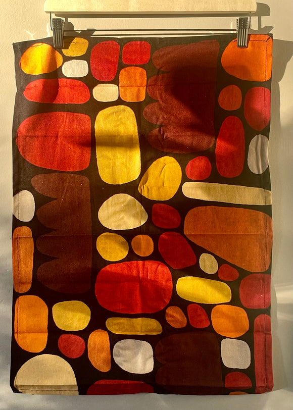 Cotton tea towel featuring licensed Aboriginal artwork, ethically printed in India using water-based inks—gentle on fabric and planet.