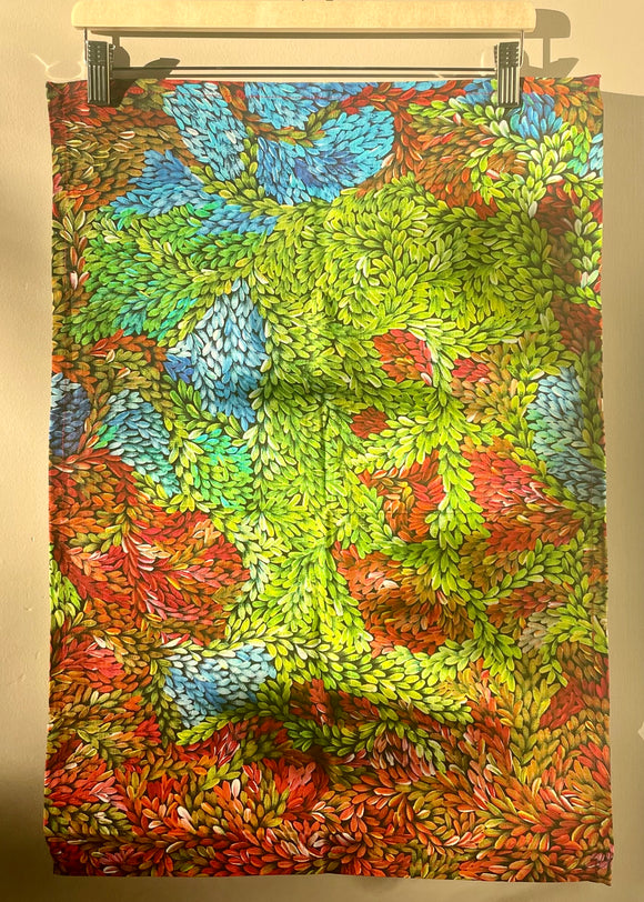 Cotton tea towel featuring licensed Aboriginal artwork, ethically printed in India using water-based inks—gentle on fabric and planet.