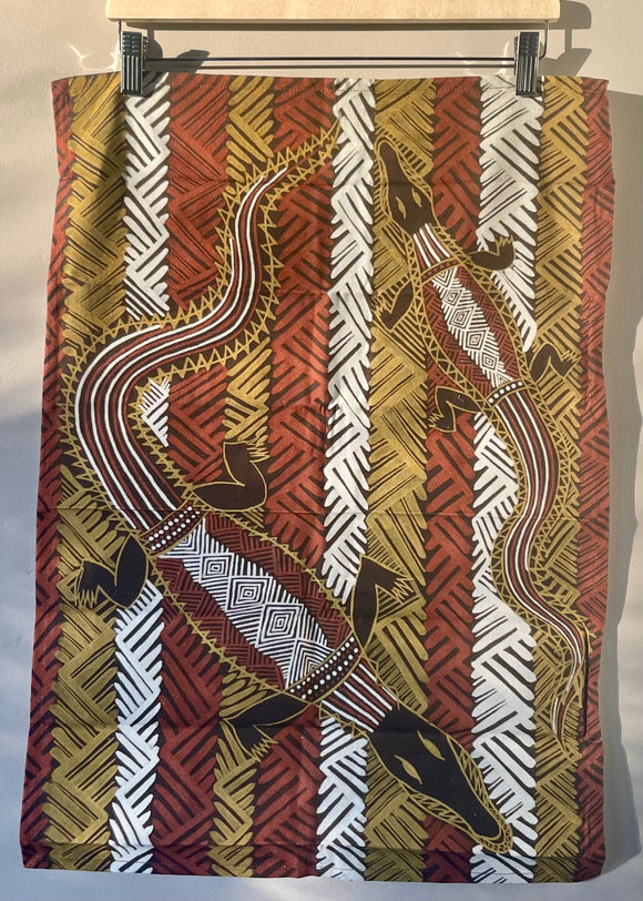 Cotton tea towel featuring licensed Aboriginal artwork, ethically printed in India using water-based inks—gentle on fabric and planet.