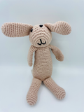 Handmade organic cotton bunny rattle in soft neutral tones, Fairtrade and ethically crafted for babies