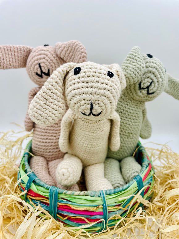 Handmade organic cotton bunny rattle in soft neutral tones, Fairtrade and ethically crafted for babies