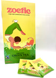 Zoetic organic green tea packaging with illustrations of a person doing yoga with a cat, the person balances a cup of tea on their legs, the background is green tones.