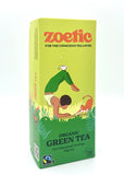 Zoetic organic green tea packaging with illustrations of a person doing yoga with a cat, the person balances a cup of tea on their legs, the background is green tones.