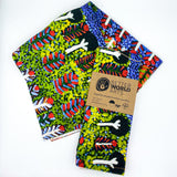 Cotton tea towel featuring licensed Aboriginal artwork, ethically printed in India using water-based inks—gentle on fabric and planet.